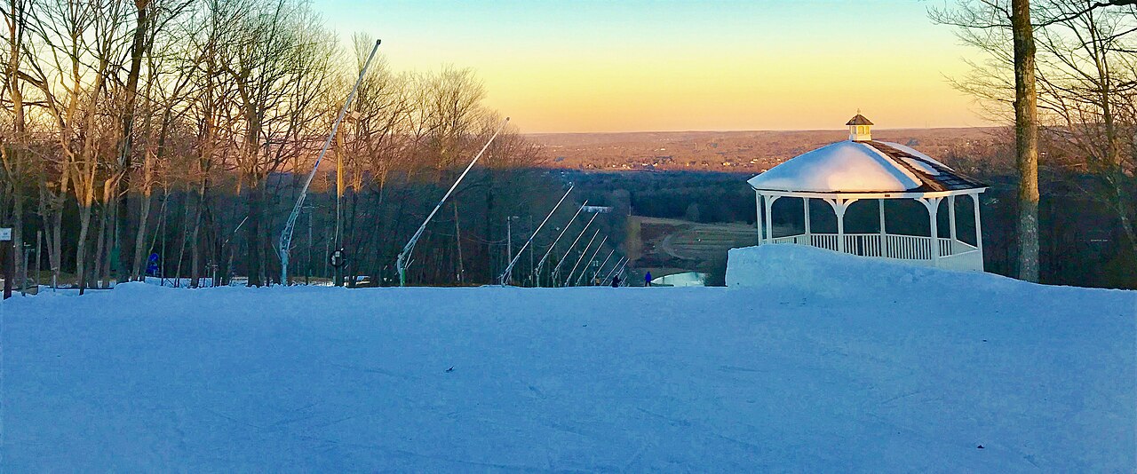 Powder Ridge, Connecticut — winter slope at sunset. Photo: Morrowlong. Archive image; resized.