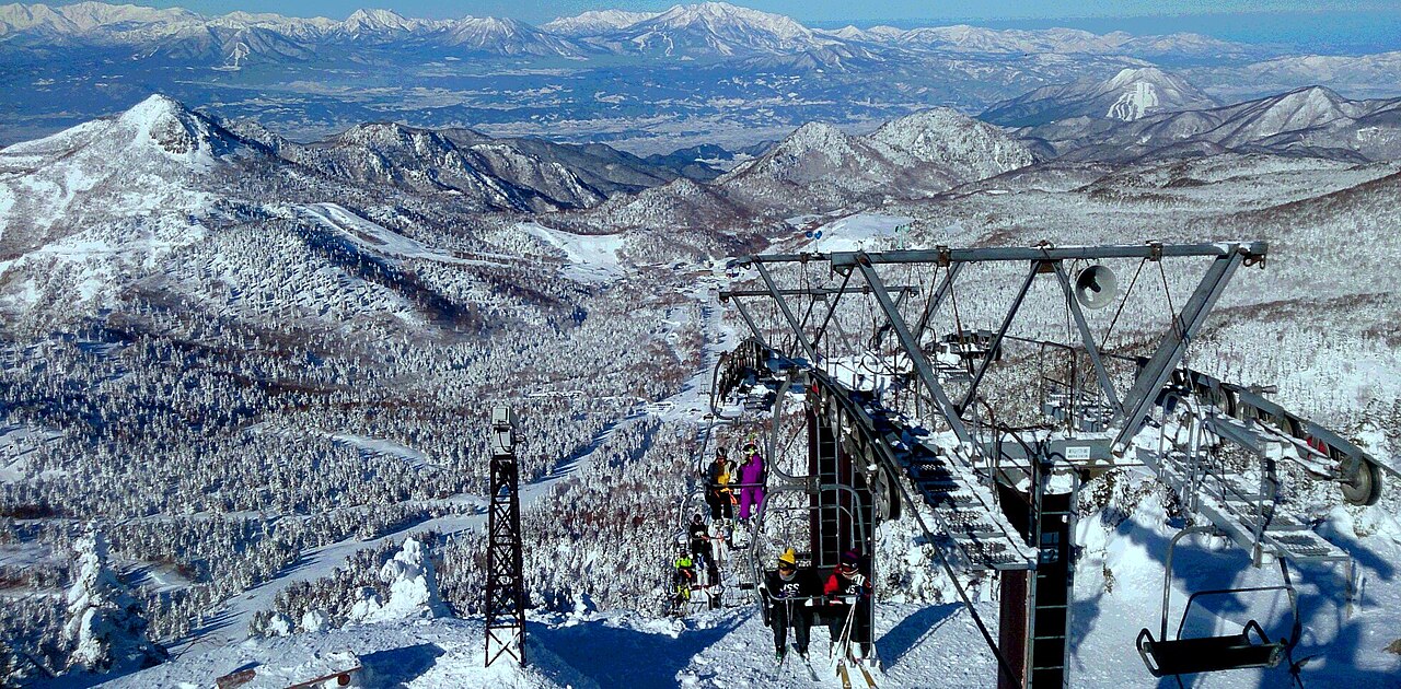 Shiga Kogen Yokoteyama Ski Area — chairlift and snowy mountain panorama. Photo: Joe Lynn Joe Lynn. Archive image; resized.